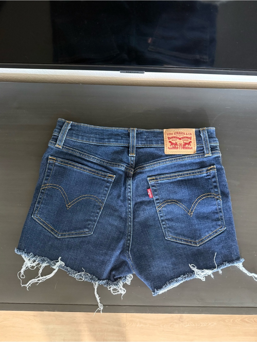 Levi's Dark Blue Cutoff Denim Shorts with Frayed Hem
